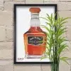 Tableau au format rectangulaire représentant une bouteille de Jack Daniel's. Reproduction sur papier d'art Hahnemühle. Mis en valeur par un cadre noir. Réalisation du tableau original par l'artiste BB de Gomme-art Studios.
