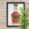 Tableau au format rectangulaire représentant une bouteille de Jack Daniel's. Reproduction sur toile. Mis en valeur par une caisse américaine. Réalisation du tableau original par l'artiste BB de Gomme-art Studios.